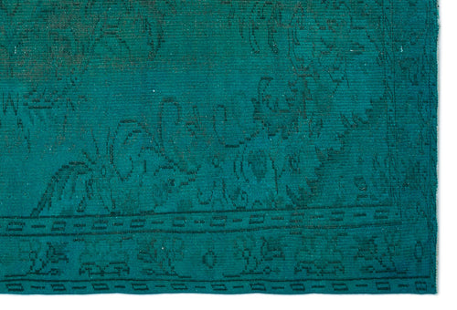Load image 1 in gallery view. Teal rug with a dark, tone-on-tone traditional floral pattern and a geometric border.