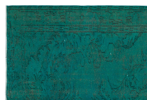 Load image 1 in gallery view. Teal rug with a dark, distressed traditional floral pattern and a linear border.