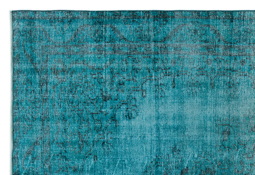Load image 1 in gallery view. Teal and black distressed rug with a faded traditional medallion pattern.