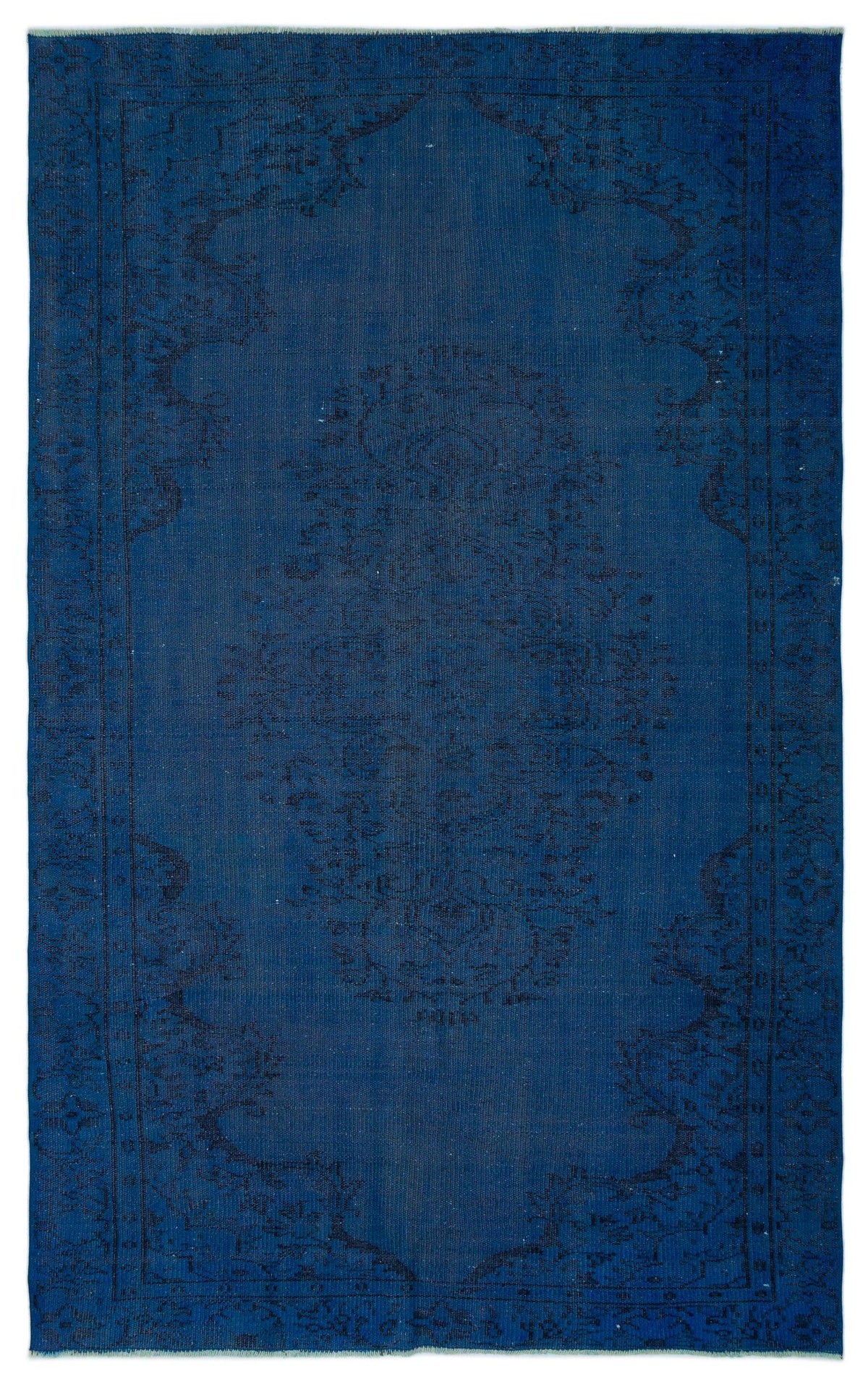 Monochromatic navy blue rug with a subtle, dark-toned traditional floral medallion pattern.