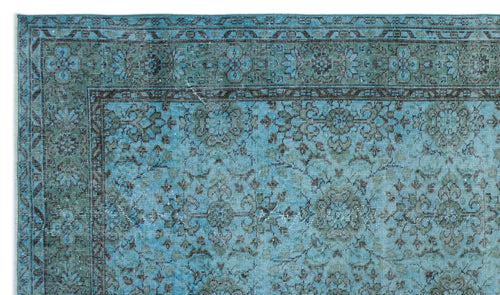 Load image 1 in gallery view. Teal and charcoal distressed rug with a traditional floral medallion pattern and a geometric border.