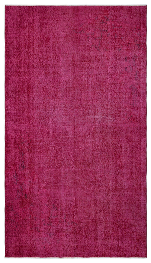 Load image 1 in gallery view. Magenta overdyed vintage rug with a distressed, low-pile texture on a white background.