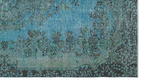 Load image 1 in gallery view. Distressed turquoise and charcoal rug with a traditional floral medallion pattern and ornate border.