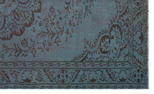 Load image 1 in gallery view. Teal and charcoal distressed rug with a traditional floral medallion pattern and a geometric border.