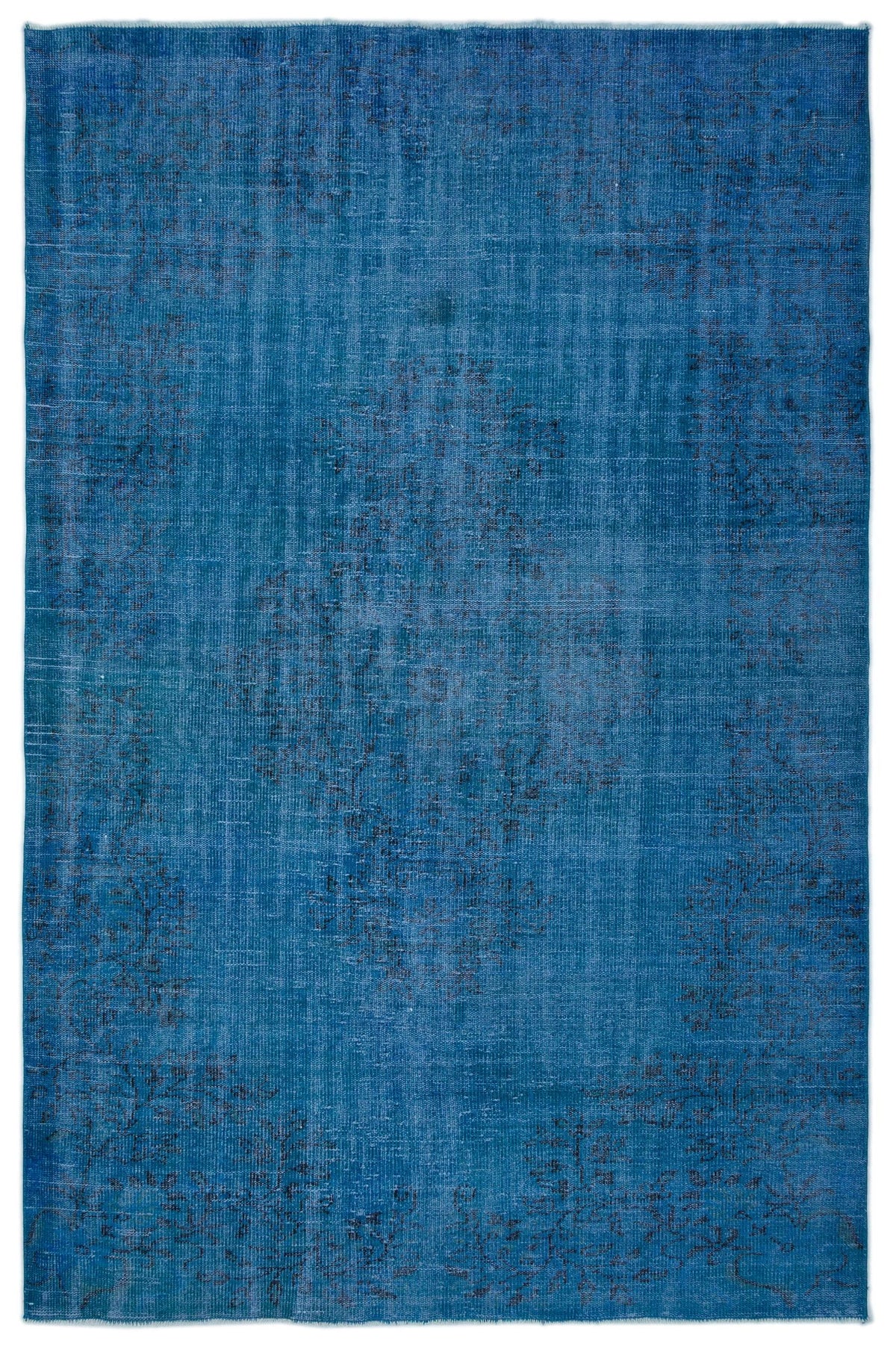 Monochromatic blue vintage-style rug with a faded, distressed traditional medallion pattern.