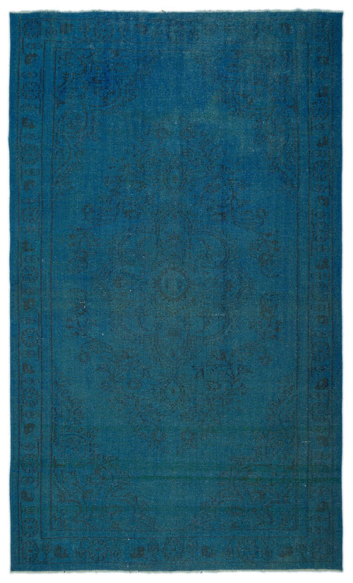 Load image 1 in gallery view. Monochromatic blue rug with a faint, distressed traditional medallion pattern and a thin border.