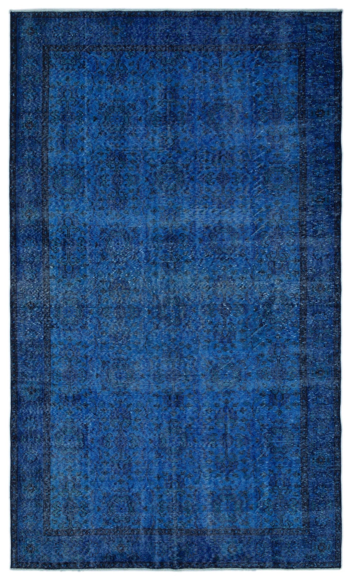 Monochromatic blue rug with a distressed, faded traditional medallion pattern and a dark border.