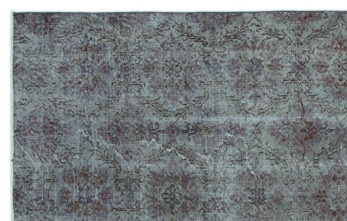 Load image 1 in gallery view. Distressed slate blue and burgundy rug with a faded traditional floral medallion pattern.