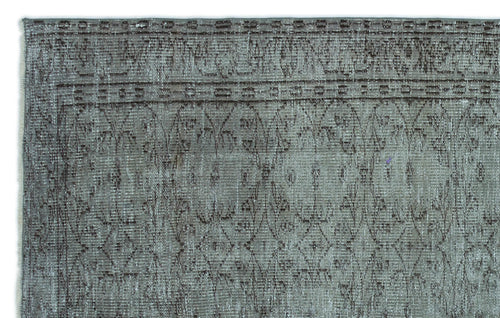 Load image 1 in gallery view. Sage green and dark brown distressed rug with a traditional lattice and floral border pattern.
