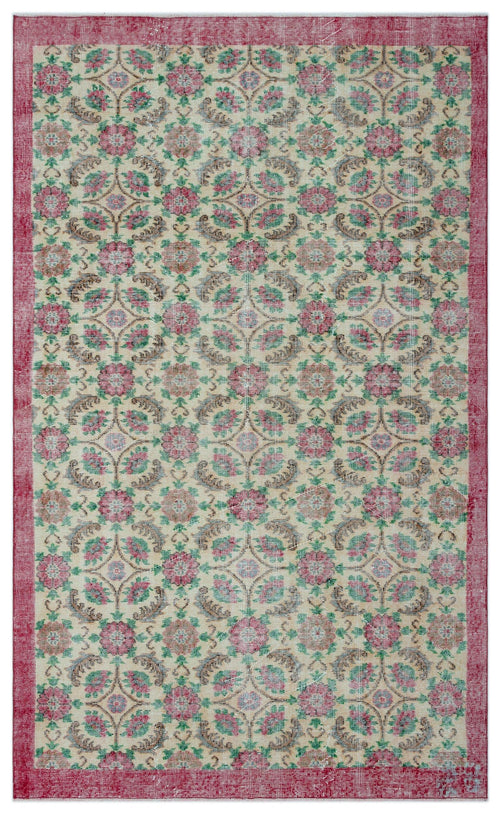 Load image 1 in gallery view. Beige rug with a red border and a repeating floral medallion pattern in muted red, green, and brown tones.