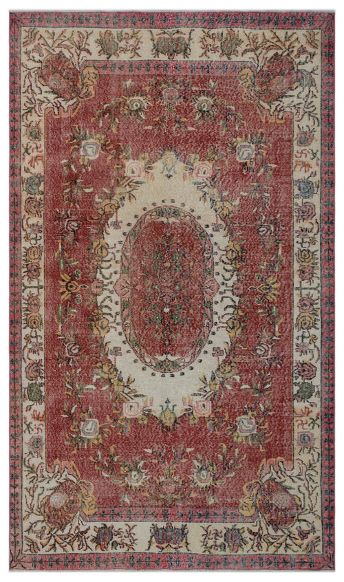 Load image 1 in gallery view. Red and cream traditional rug with a central floral medallion and intricate botanical border.