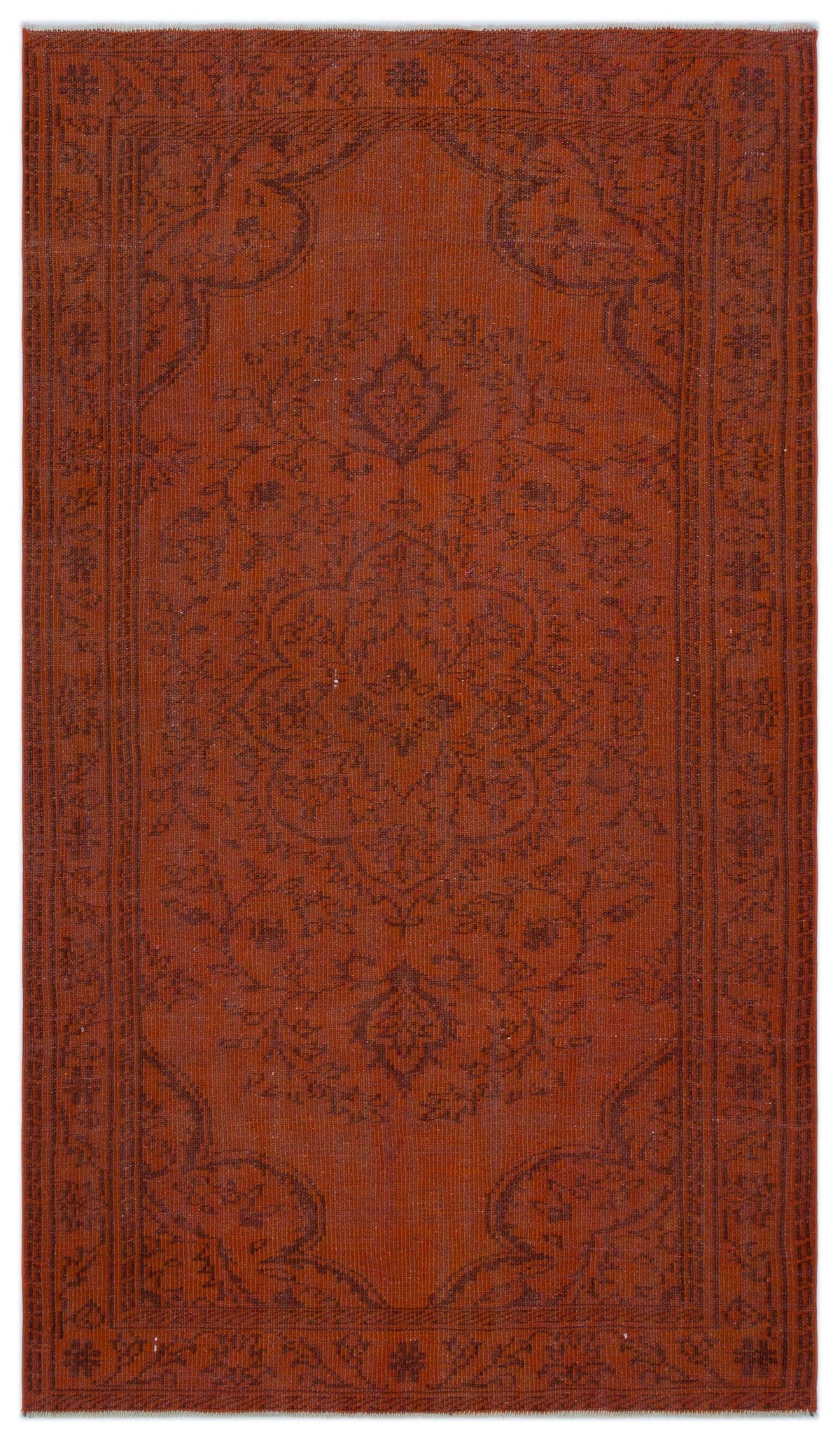 Rust-colored rug with a dark brown traditional floral medallion pattern and a bordered edge.