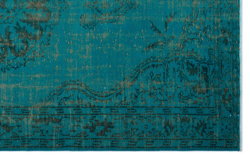 Load image 1 in gallery view. Teal and dark brown rug with a distressed traditional floral medallion pattern and a geometric border.
