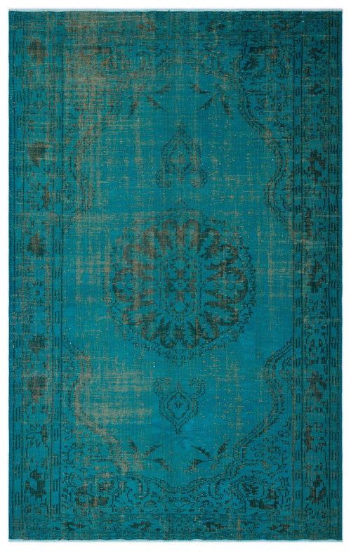 Load image 1 in gallery view. Teal and charcoal distressed rug with a central floral medallion and traditional border pattern.