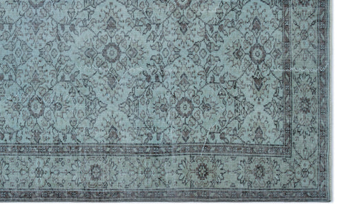 Load image 1 in gallery view. Light blue rug with a dark brown traditional floral medallion pattern and a detailed border.