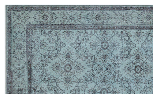 Load image 1 in gallery view. Light blue and dark brown traditional rug with an intricate floral medallion pattern and a decorative border.