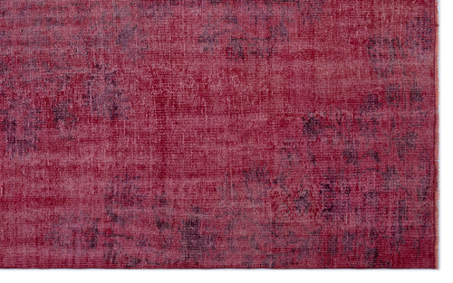 Load image 1 in gallery view. Deep red and magenta distressed rug with a faded, abstract texture.