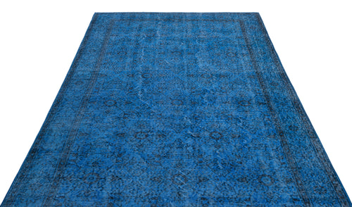 Load image 1 in gallery view. Deep blue vintage-style rug with a distressed traditional medallion pattern and a dark border on a white background.