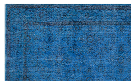 Load image 1 in gallery view. Bright blue rug with a black distressed traditional floral medallion pattern and a bordered edge.