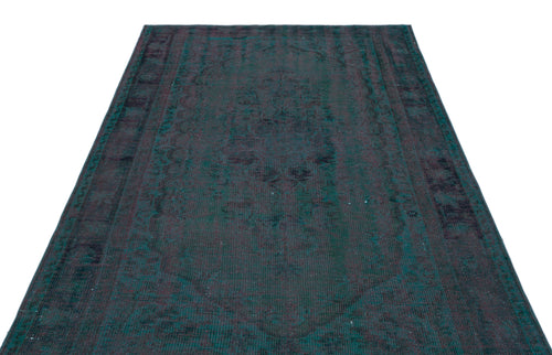 Load image 1 in gallery view. Dark teal and black distressed traditional rug with a faded central medallion pattern on a white background.
