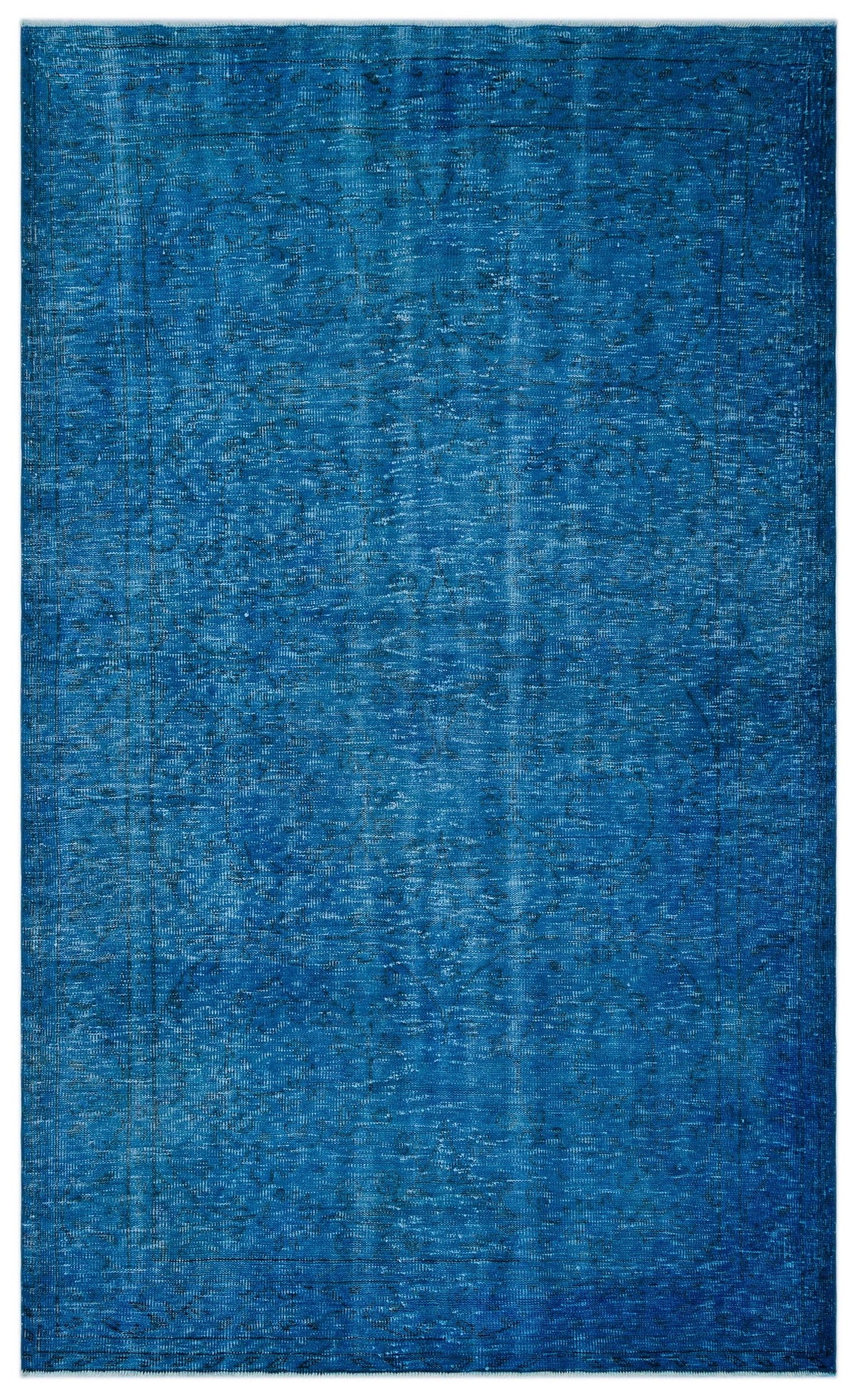 Solid blue distressed vintage-style rug with a faint, worn traditional medallion pattern.