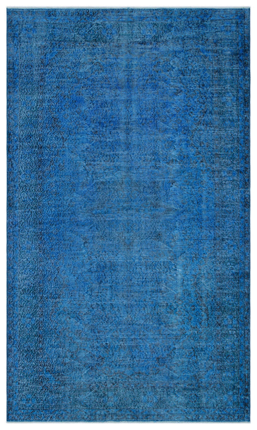 Load image 1 in gallery view. Monochromatic blue distressed rug with a faint, traditional central medallion pattern.