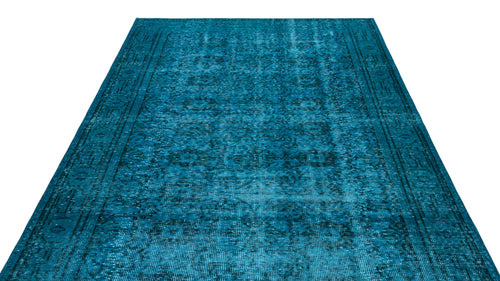Load image 1 in gallery view. Teal distressed traditional area rug with a faded ornate medallion pattern and a geometric border.