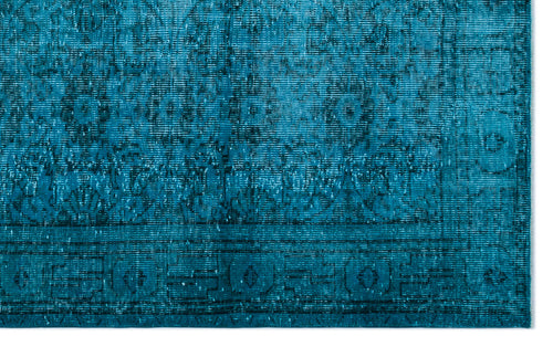 Load image 1 in gallery view. Teal distressed rug with a faded traditional medallion pattern and a geometric border.