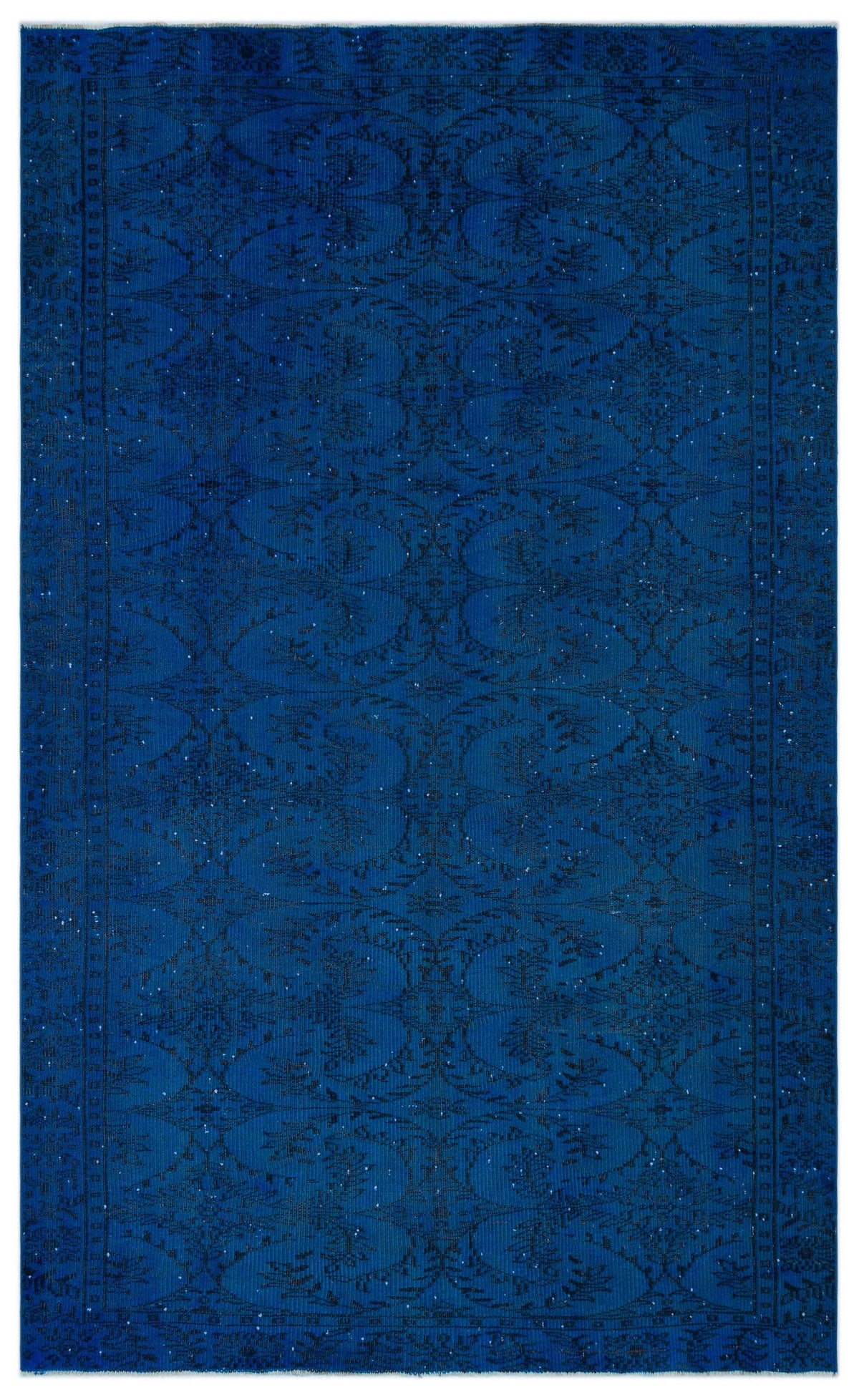 Monochromatic royal blue rug with a distressed, repeating floral medallion pattern and a decorative border.