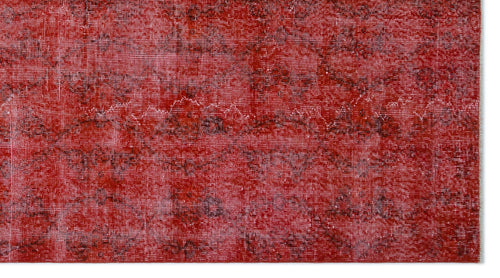 Load image 1 in gallery view. Distressed red rug with a faded black traditional pattern and visible white woven texture.