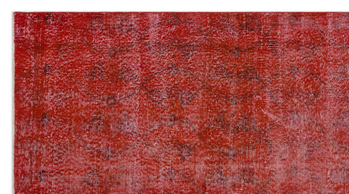 Load image 1 in gallery view. Distressed red rug with a faint, dark grey traditional medallion pattern.