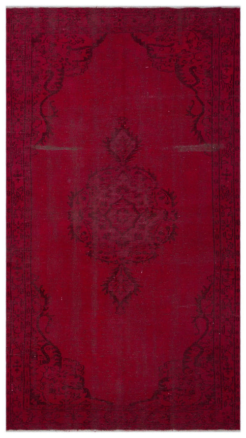 Load image 1 in gallery view. Deep red vintage-style rug with a faded black central medallion and ornate border pattern.