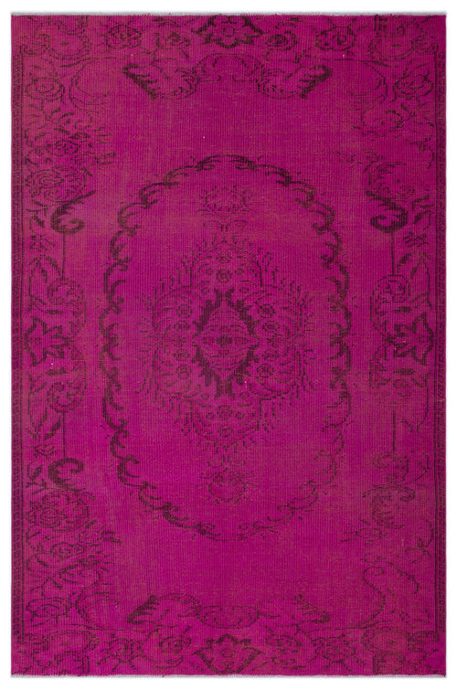 Load image 1 in gallery view. Magenta rug with a dark purple distressed floral medallion pattern and ornate border on a white background.