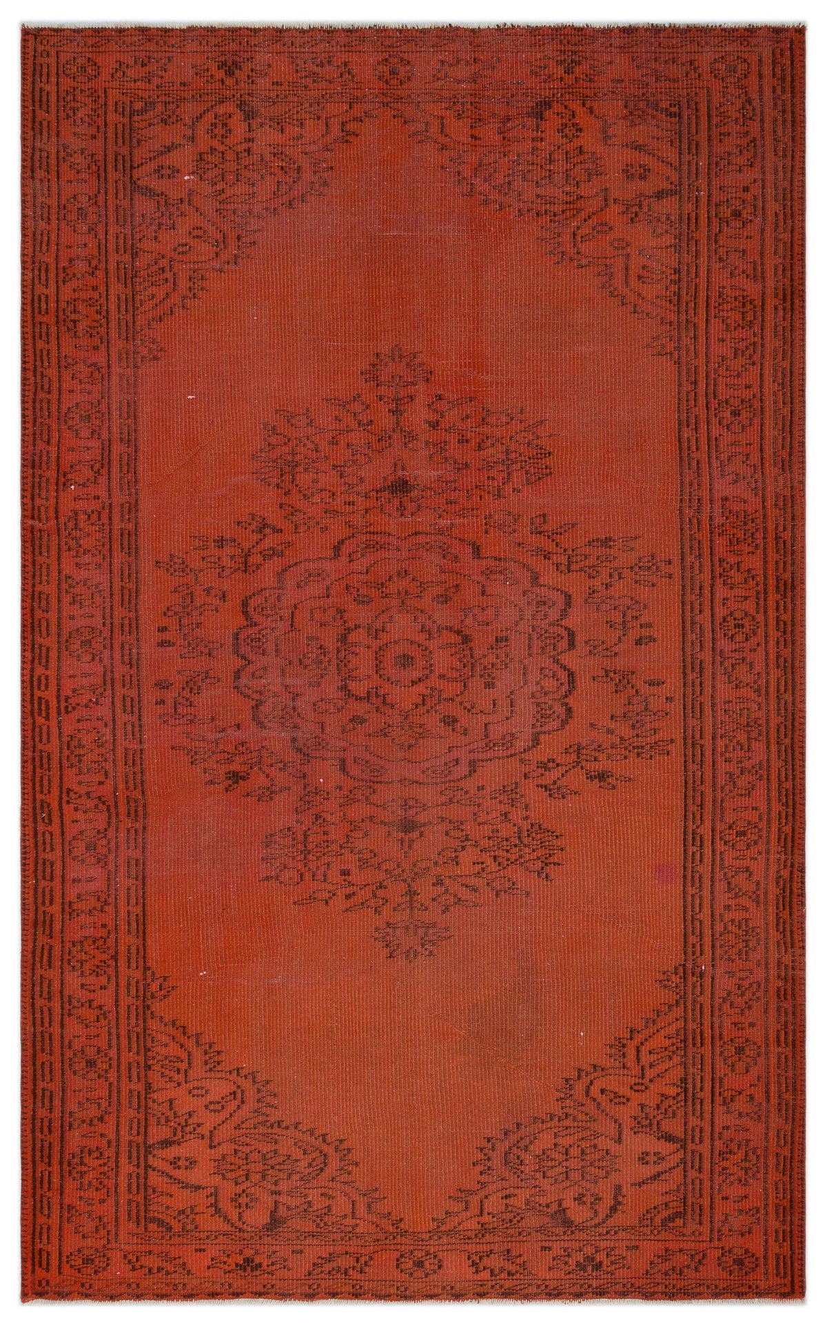 Rust-colored rug with a black central floral medallion and matching corner motifs, featuring a traditional border.