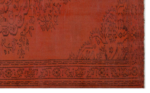 Load image 1 in gallery view. Rust-colored rug with a dark brown traditional floral border and medallion pattern on a white background.
