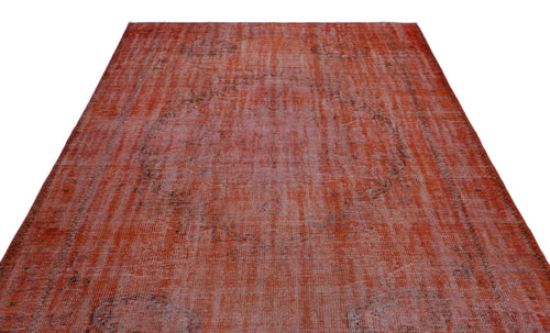 Load image 1 in gallery view. Distressed terracotta and rust-colored rug with a faded central medallion and dark grey intricate border details.