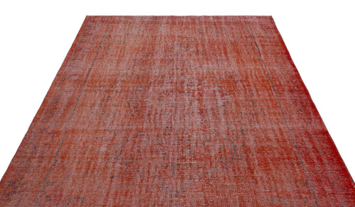 Load image 1 in gallery view. Distressed terracotta red rug with a faded traditional medallion pattern and dark grey border details.