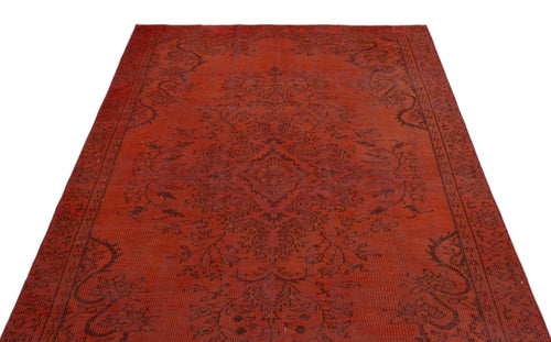 Load image 1 in gallery view. Distressed red rug with a dark brown traditional floral medallion and border pattern on a white background.