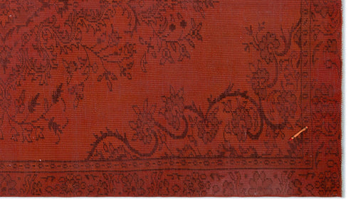 Load image 1 in gallery view. Rust-red rug with a dark brown floral vine border and intricate botanical pattern.