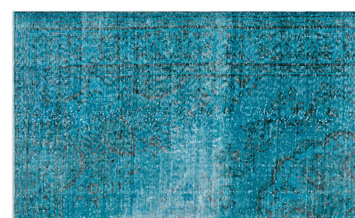 Load image 1 in gallery view. Teal and black distressed rug with a faded traditional medallion pattern.