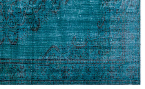 Load image 1 in gallery view. Teal and black distressed rug with a faded traditional medallion pattern and a linear border.