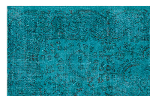 Load image 1 in gallery view. Teal rug with a distressed, dark charcoal traditional floral medallion pattern.