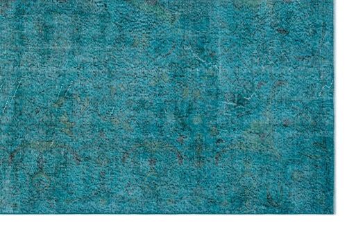 Load image 1 in gallery view. Teal distressed rug with a faint, dark grey traditional floral pattern.