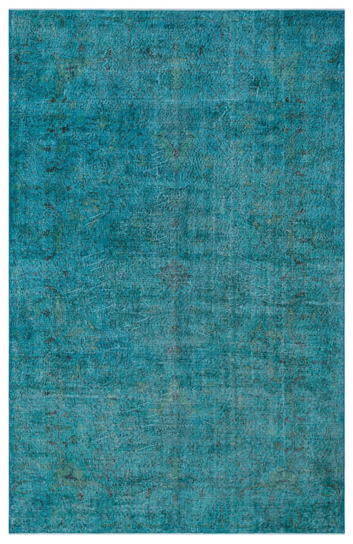 Teal distressed rug with a faint, tonal traditional medallion pattern.