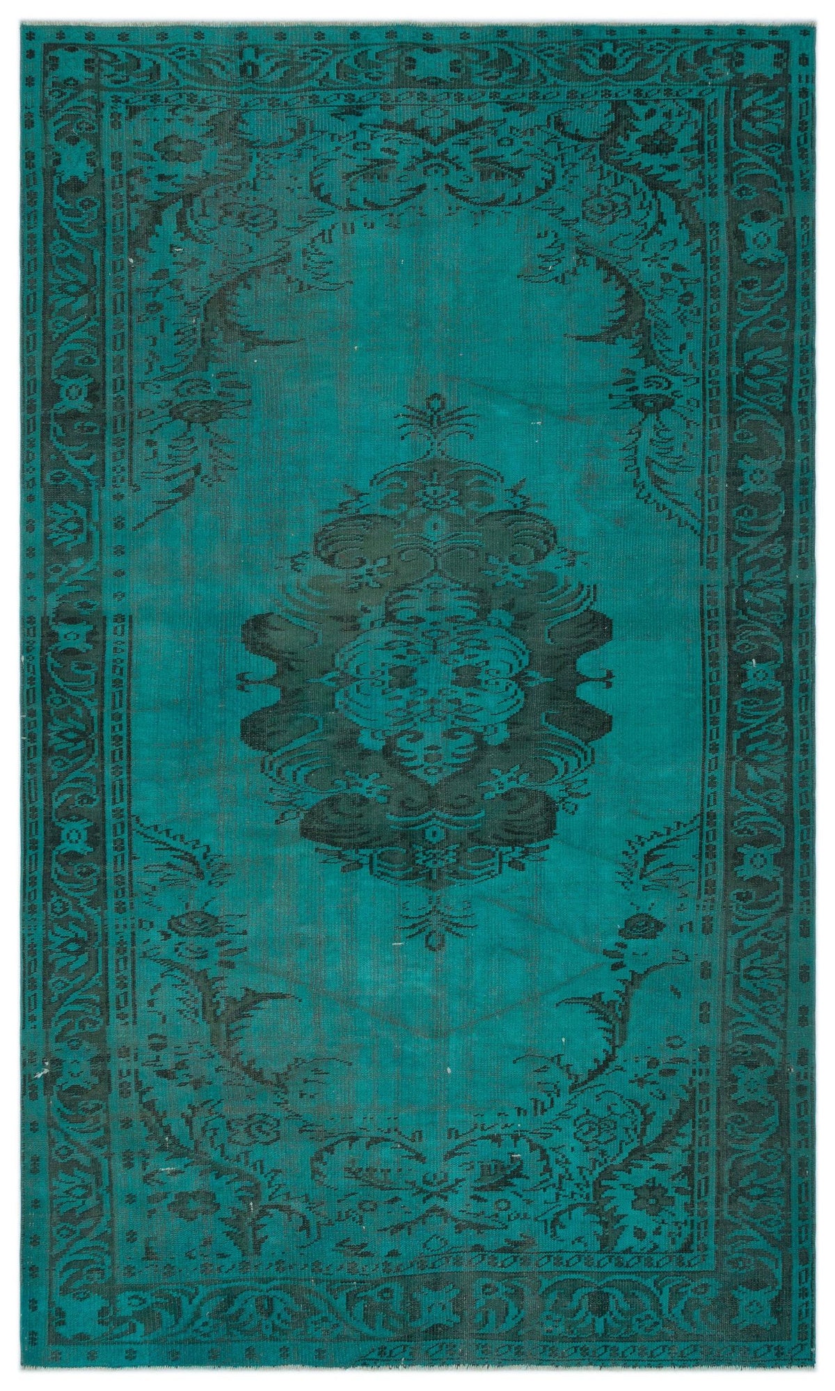 Teal and black distressed rug with a central floral medallion and ornate border pattern.