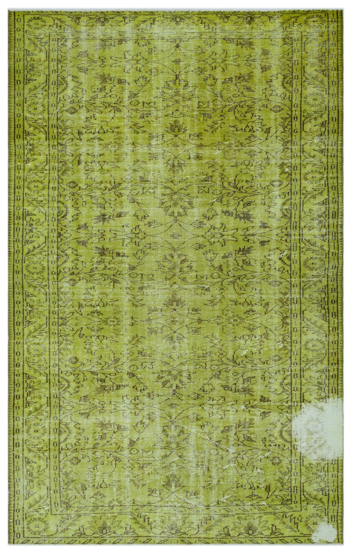 Chartreuse and olive green vintage-style rug with a distressed floral medallion pattern and a bordered edge.