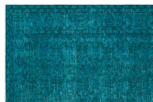 Load image 1 in gallery view. Teal distressed rug with a traditional Persian-style border and intricate geometric medallion pattern.