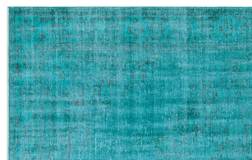 Load image 1 in gallery view. Teal and turquoise distressed rug with a faded traditional medallion pattern.