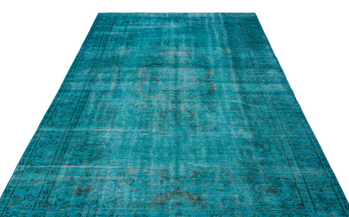 Load image 1 in gallery view. Teal distressed rug with a faded traditional medallion pattern and a dark border on a white background.