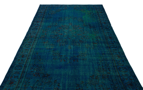Load image 1 in gallery view. Deep blue and teal vintage-style rug with a distressed traditional medallion pattern on a white background.